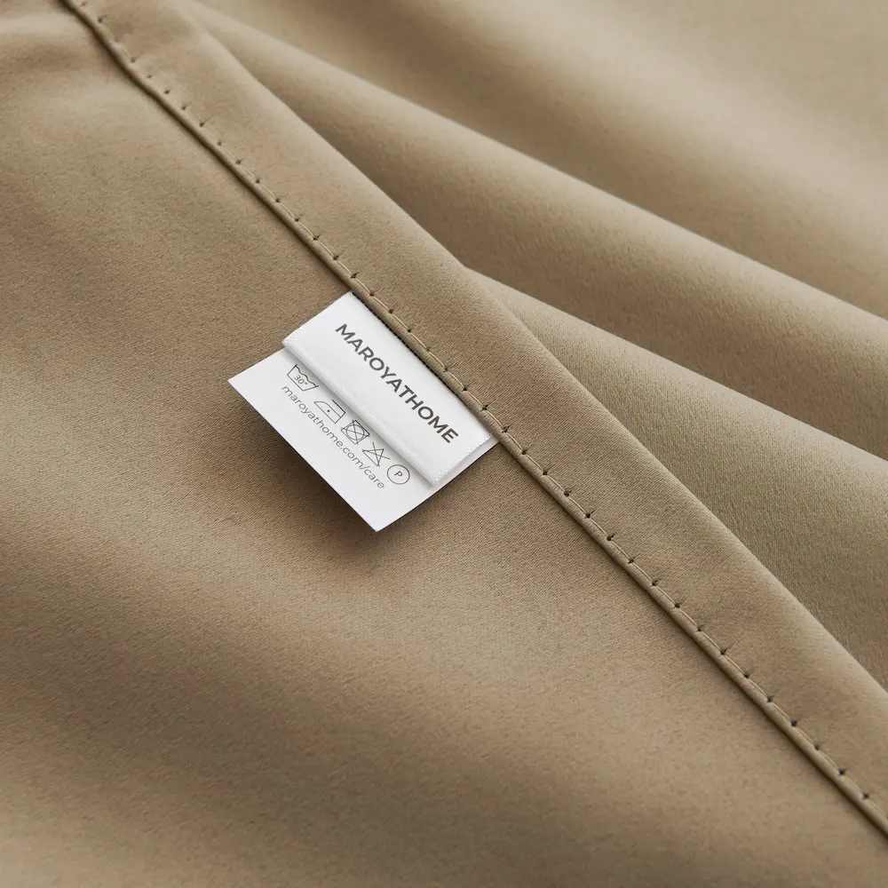 Ruben Elsa Lemoni Licht taupe stof met merklabel