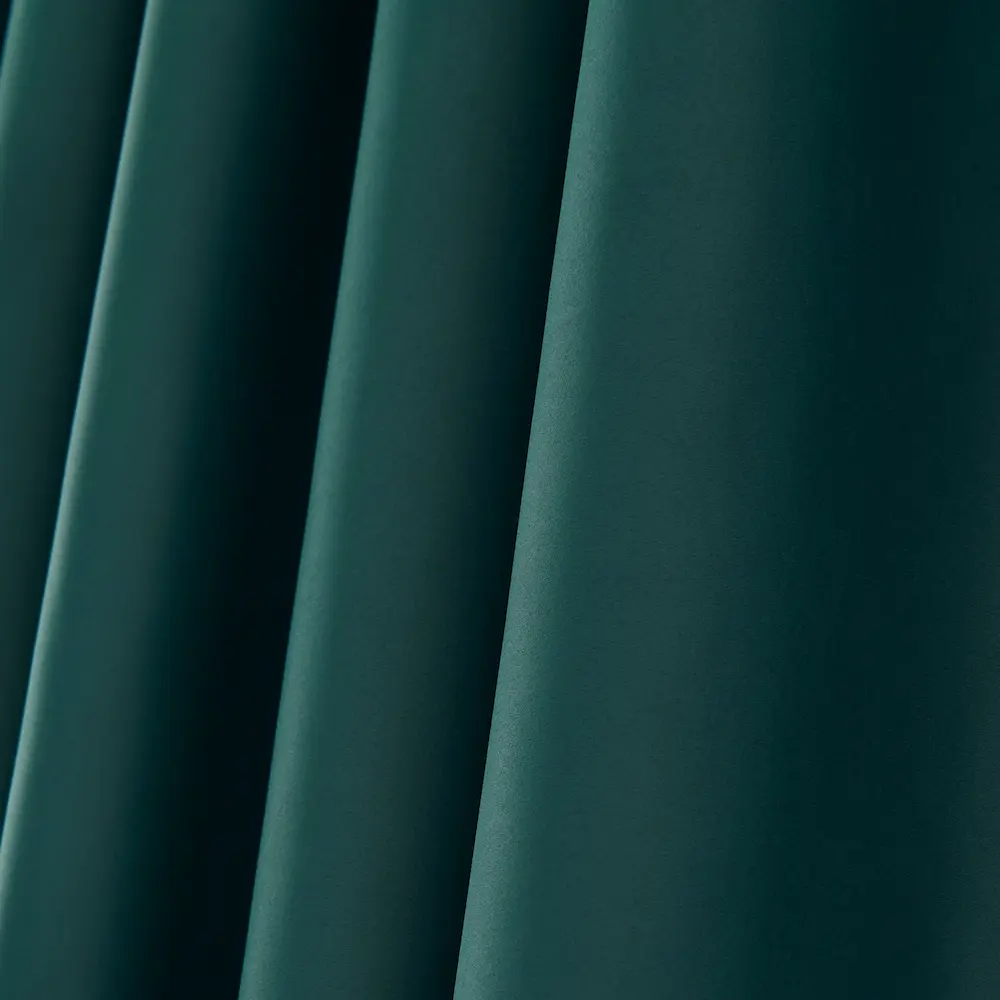 Ruben verduisterende gordijnen met ringen donker groen zijkant