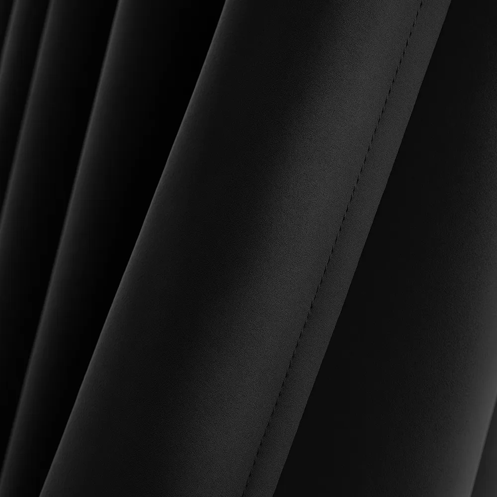 Lemoni zwart verduisterend gordijn - hangend zijkant met zoom