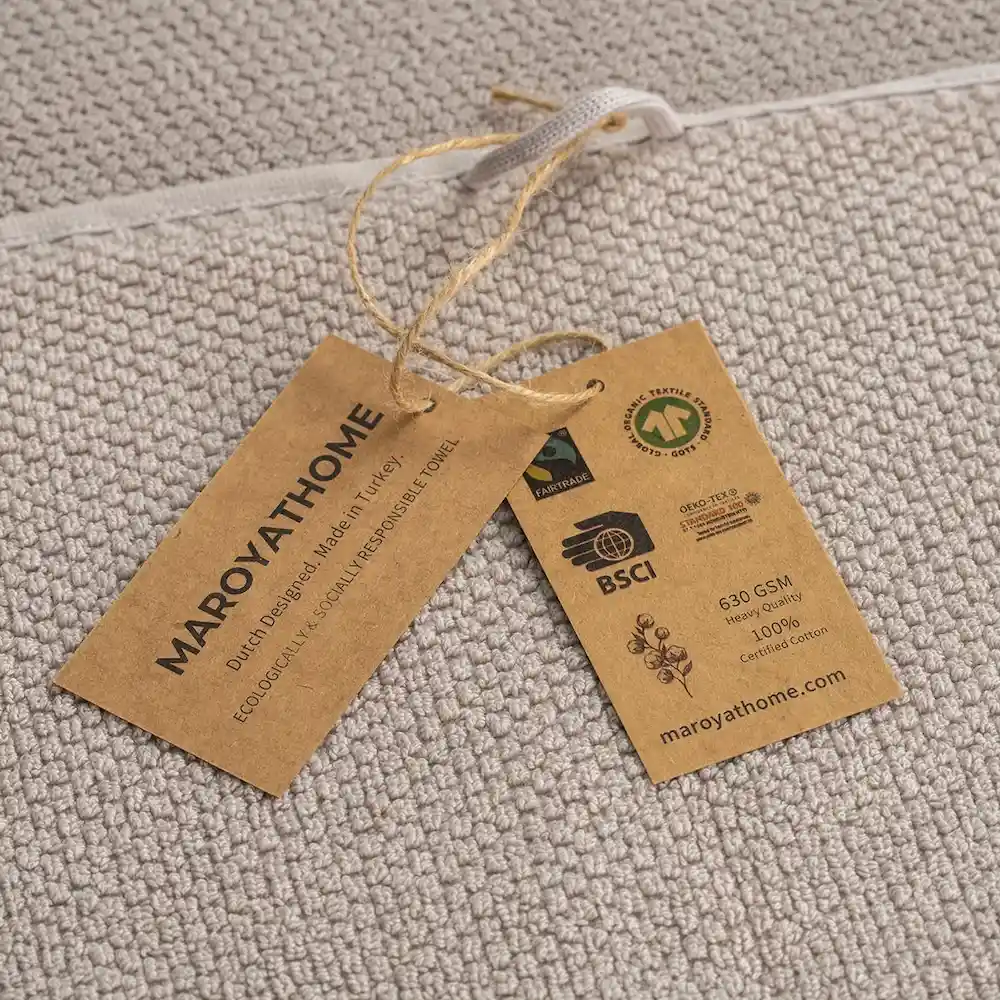 Uno handdoeken beige 100% katoen en gecertifieerd met GOTS en FAIRTRADE