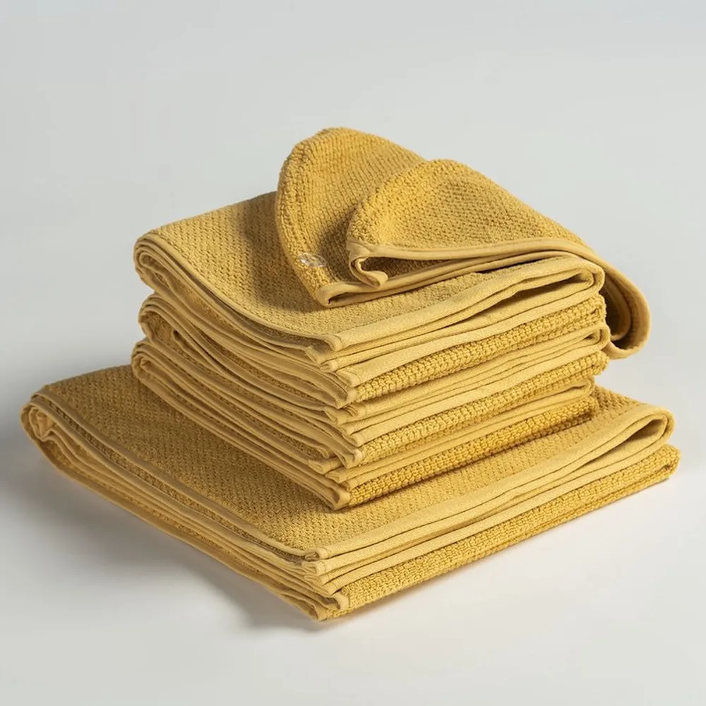 Uno set handdoeken met handdoeken, badlaken en haarhanddoek geel