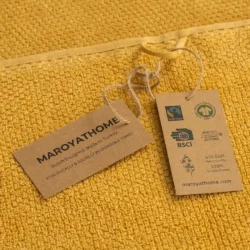Uno handdoeken geel 100% katoen en gecertifieerd met GOTS en FAIRTRADE