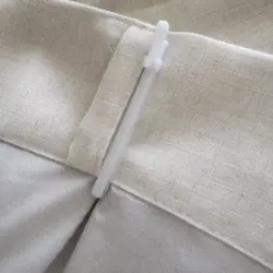 Marion 100% verduisterend Off White linnen gordijn. Plooihaak en verticale lus achterkant