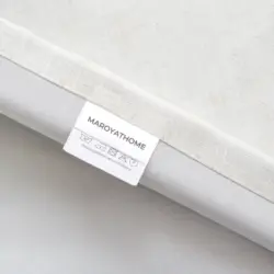 Marion 100% verduisterend Off White linnen gordijn. Waslabel met instructies.